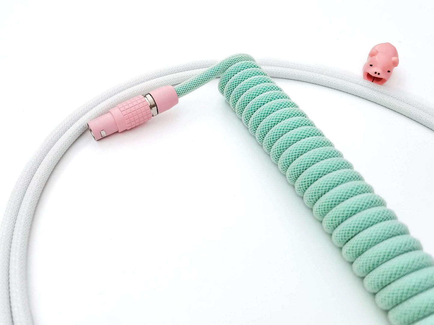 Green cable with pink Flemo connector and pink cable bite bear