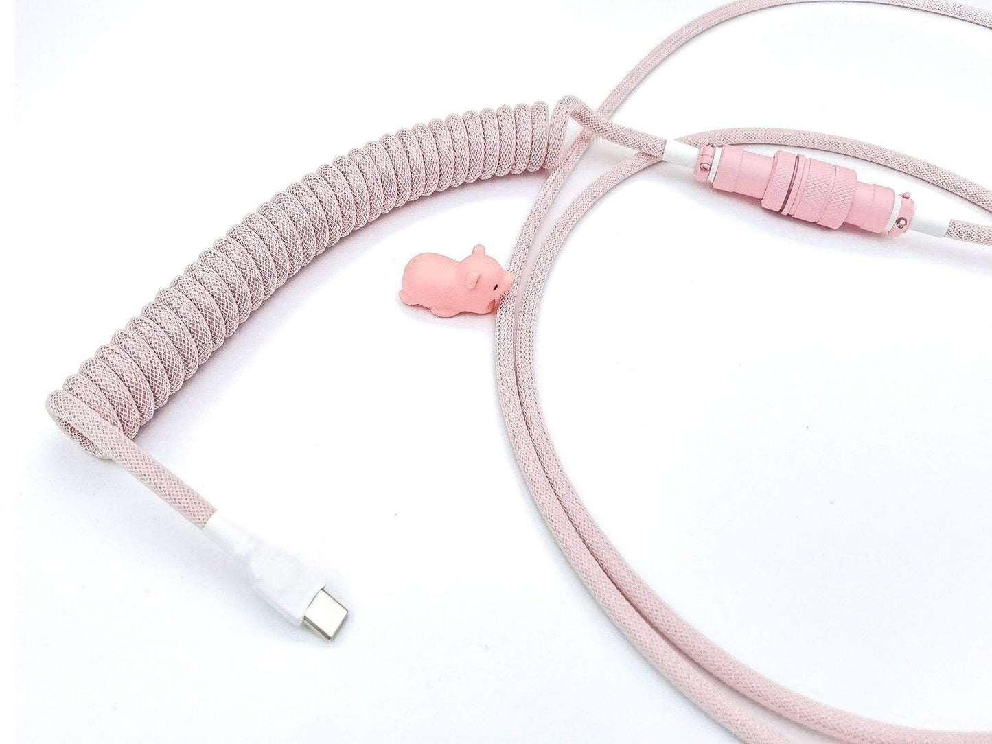 Matching coil cable for pink keycaps and pink mechanical keyboards with white heat-shrink and pink Aviator and pink cable bite