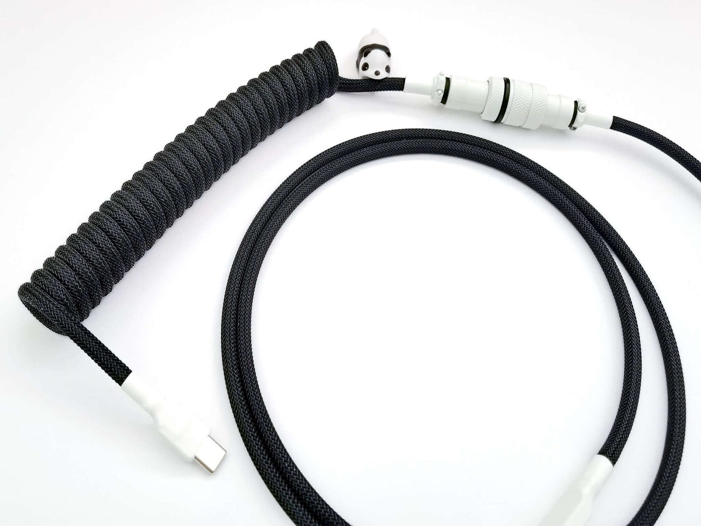 coiled cable in black and white designed for WOB and BOW keycaps with white Aviator and black coil