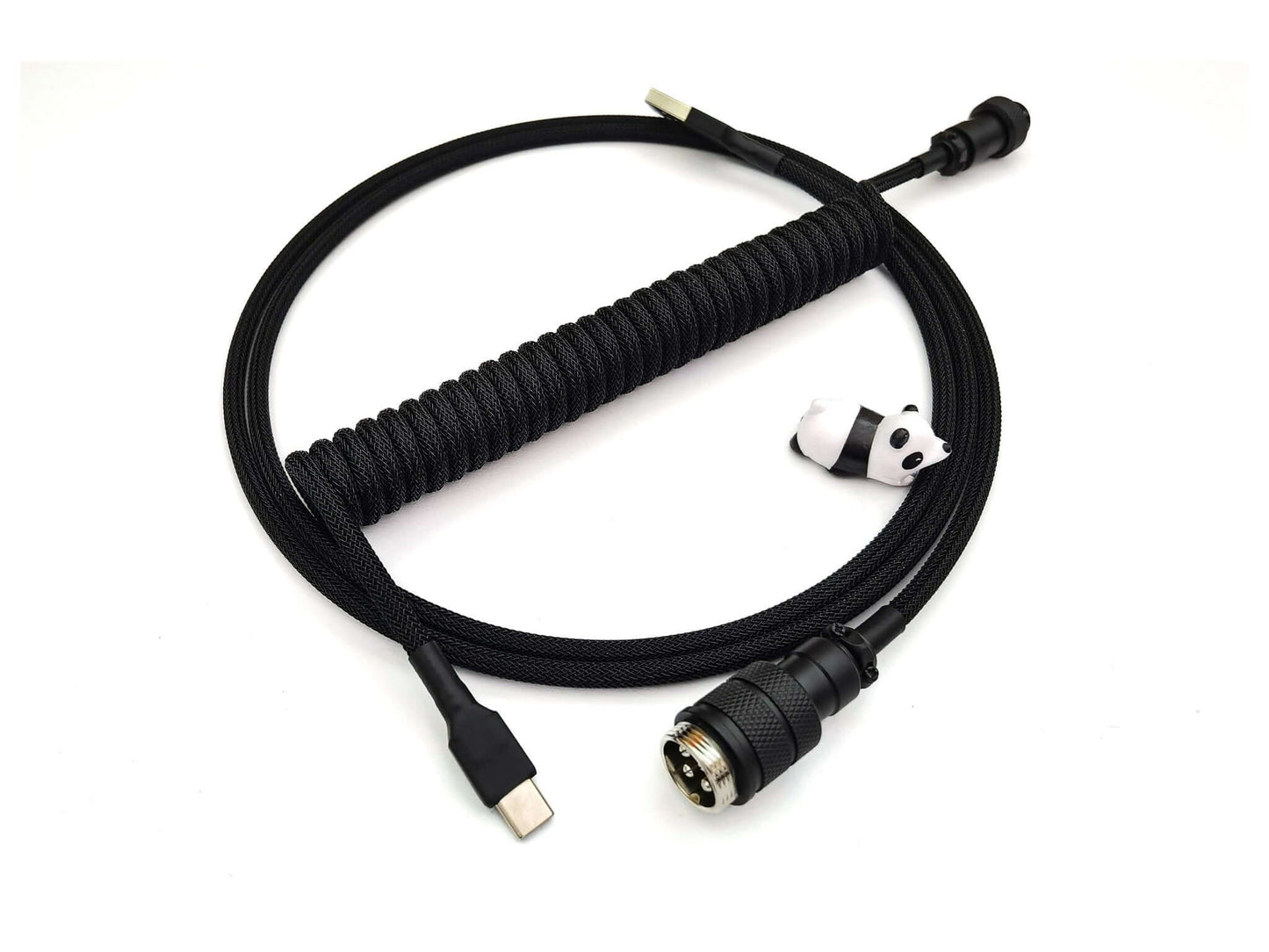 Black coiled cable with black Gx16 connector, black heat-shrink and USB C connection, and panda cable bite protector