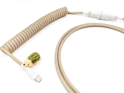 Cream custom USB C cable with cable bite protector, white Gx16 connector and USB C to C connection