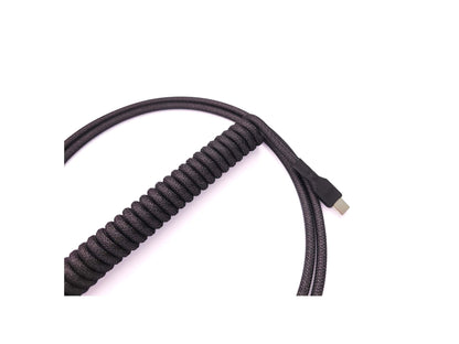 Dark grey coiled keyboard cable with USB C connection