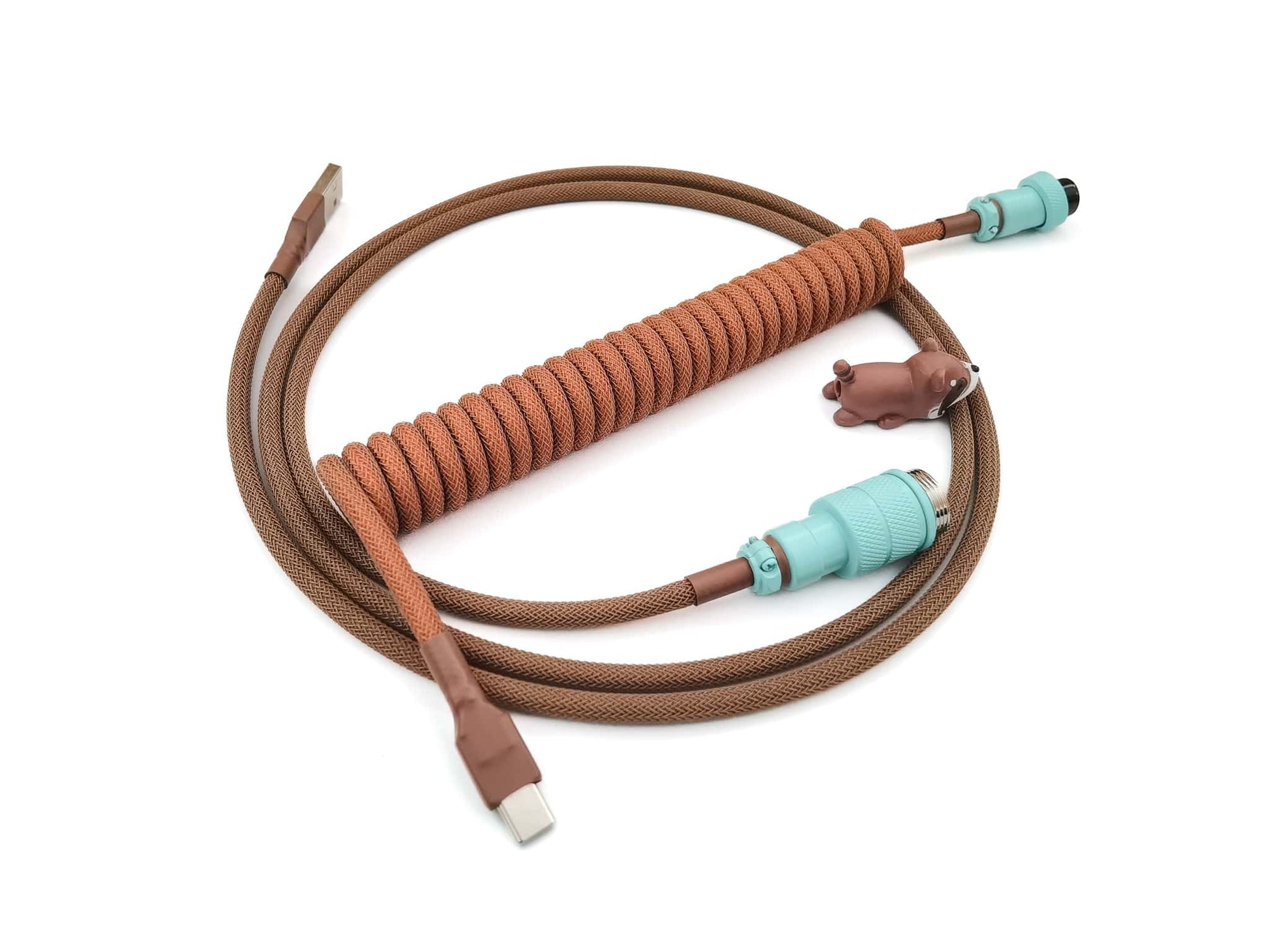 Orange coiled keyboard cable for GMK Copper keycaps with teal Gx16 and brown heat shrink