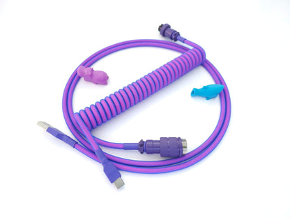 Coiled keyboard cable for GMK Laser keycaps with purple Aviator and purple heat shrink