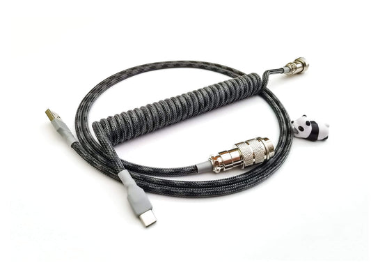 Coiled cable designed to match GMK Modern Dolch keycaps. With grey and black colors and Gx16 connector.
