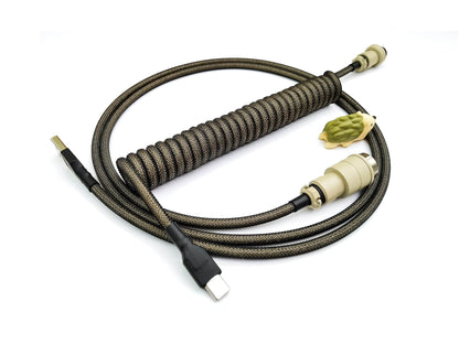 Coiled keyboard cable for GMK Nines keycaps with beige Gx16 and black heat shrink