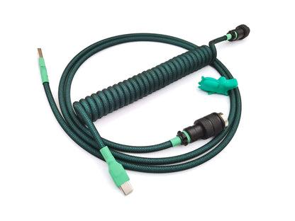 Coiled cable matching GMK Terror Below keycaps with black Gx16 connector and green heat shrink and USB C connection