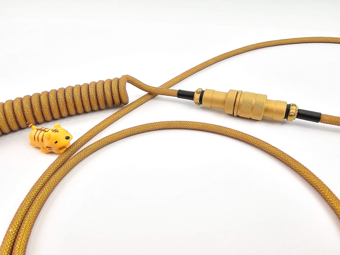 Gold Gx16 Aviator connector on coi cable with black heat shrink