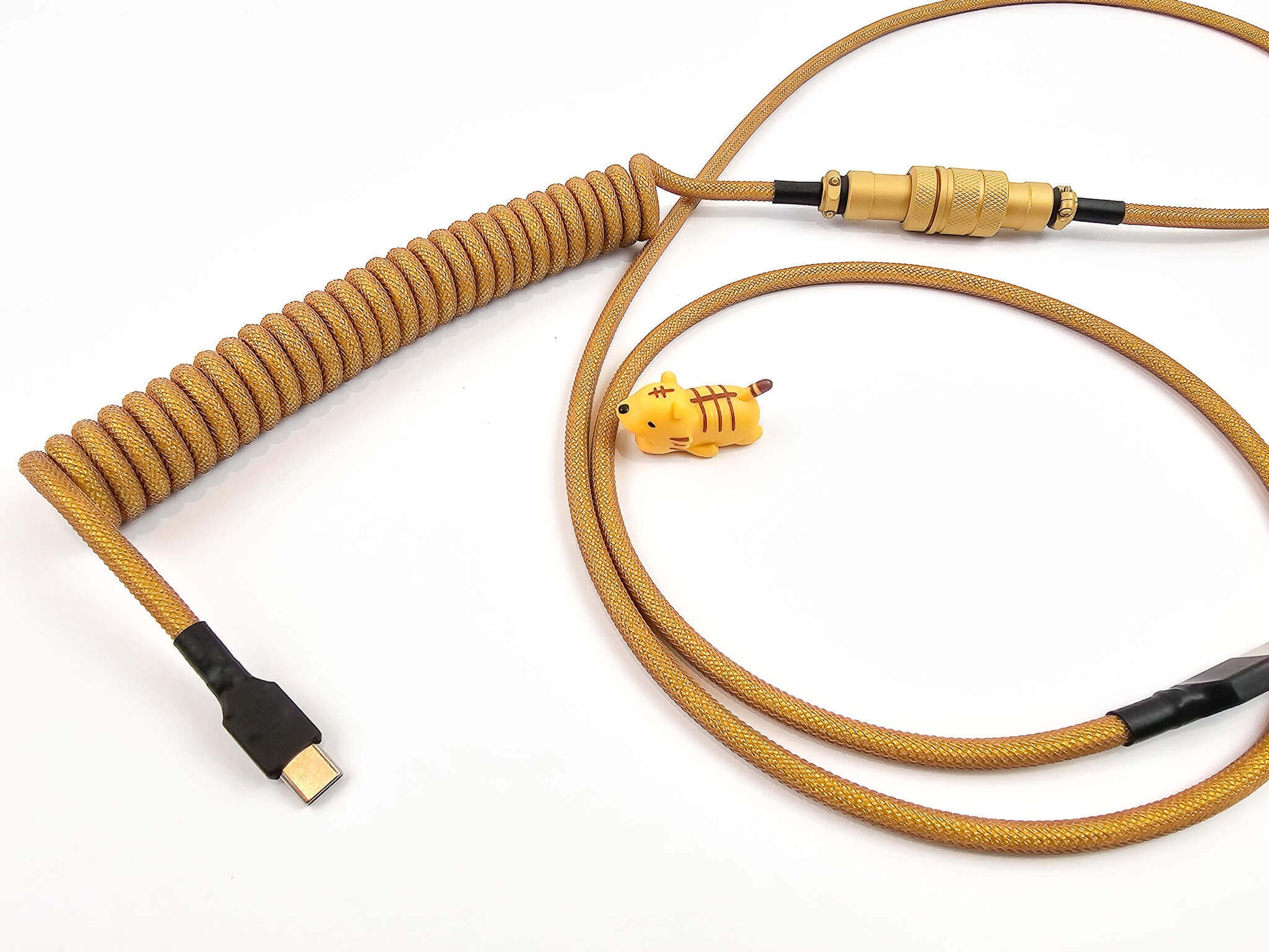 Gold coiled keyboard cable with USB C to C connection, coil and golden Gx16 Aviator connector