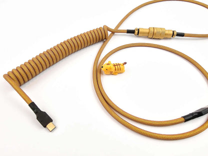 Gold coiled keyboard cable with USB C to C connection, coil and golden Gx16 Aviator connector