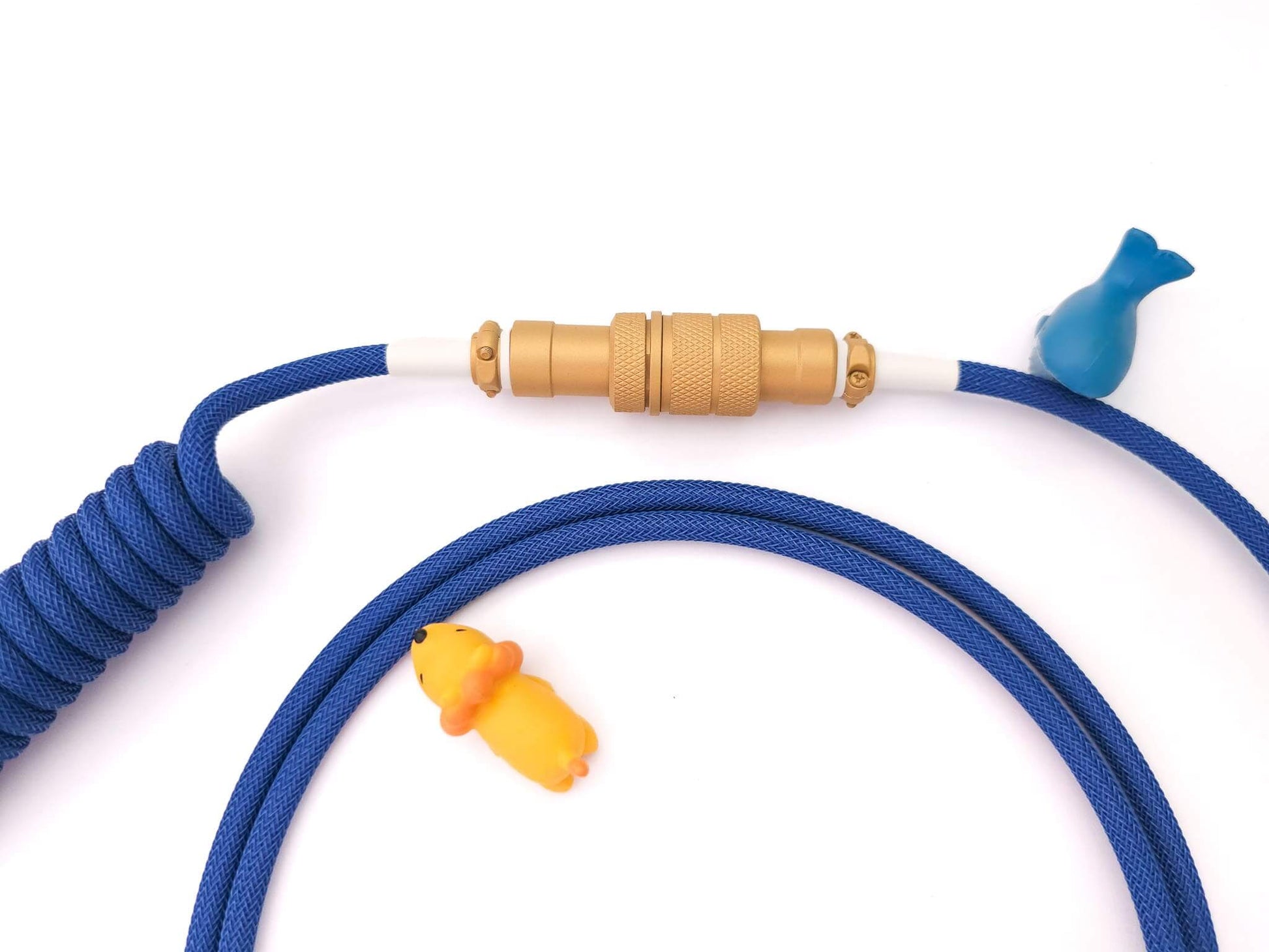 4-pin Gx16 Aviator connector painted in gold with white heat shrink on blue coil