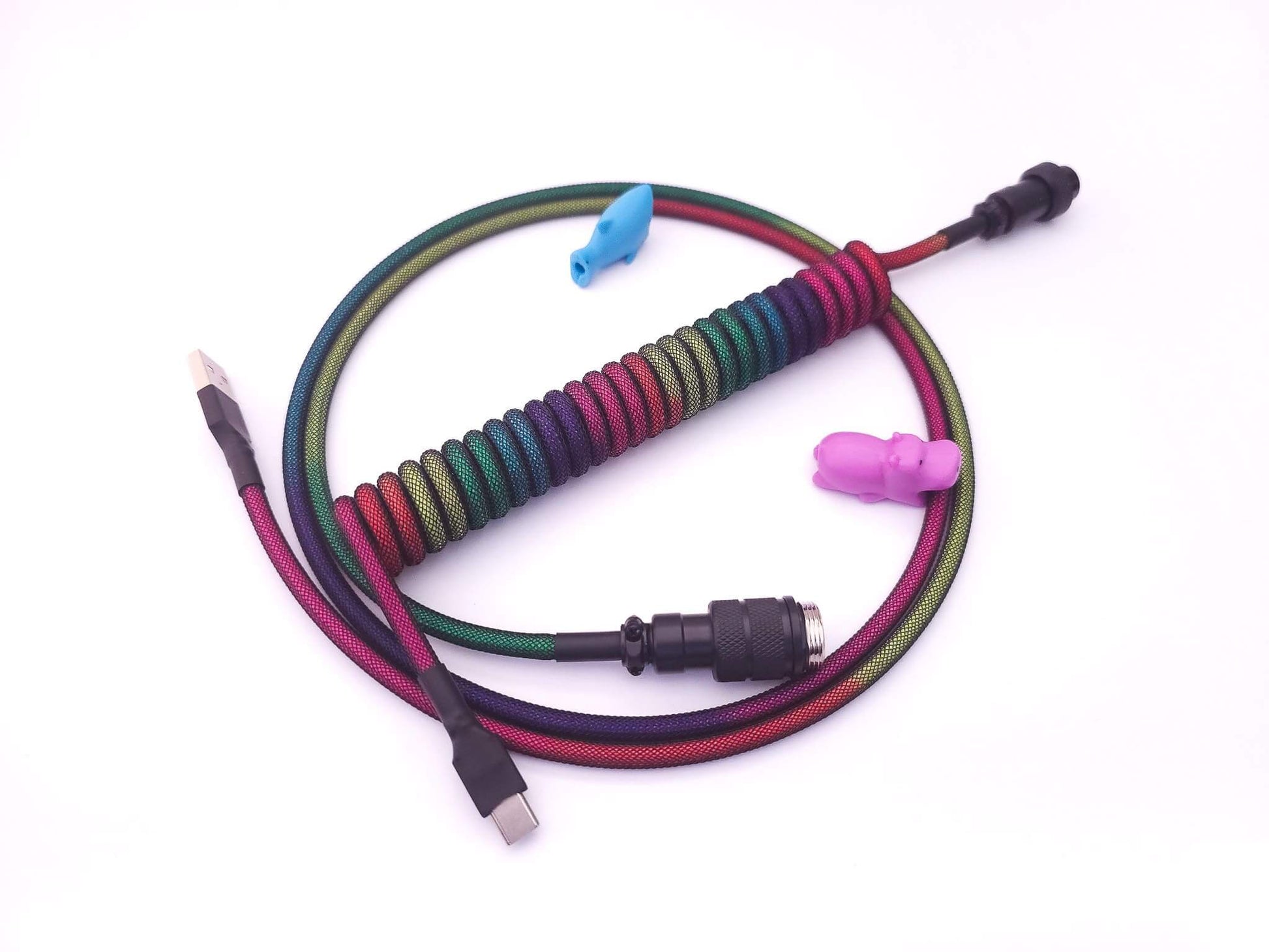 Coiled cable for GMK Midnight Rainbow keycaps with black Gx16 connector, black heat shrink and USB C connection and blue and purple cable bites