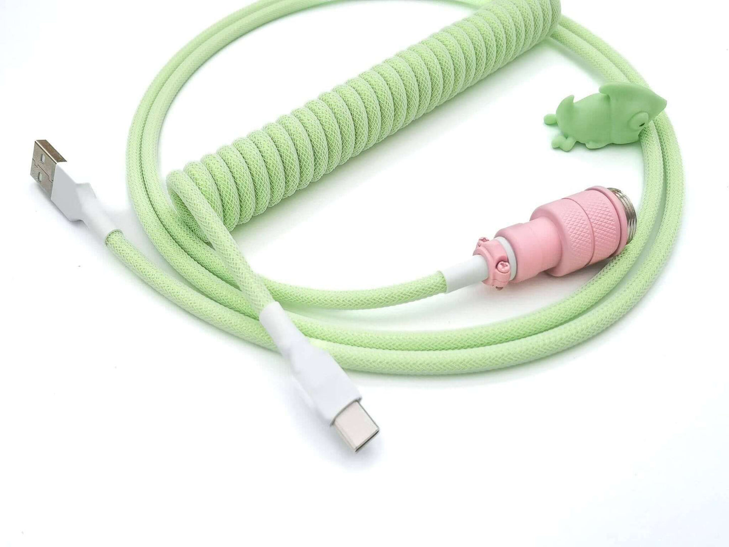 Keyboard cable in mint color coil with pink Aviator connector, USB C to A and white heat-shrink