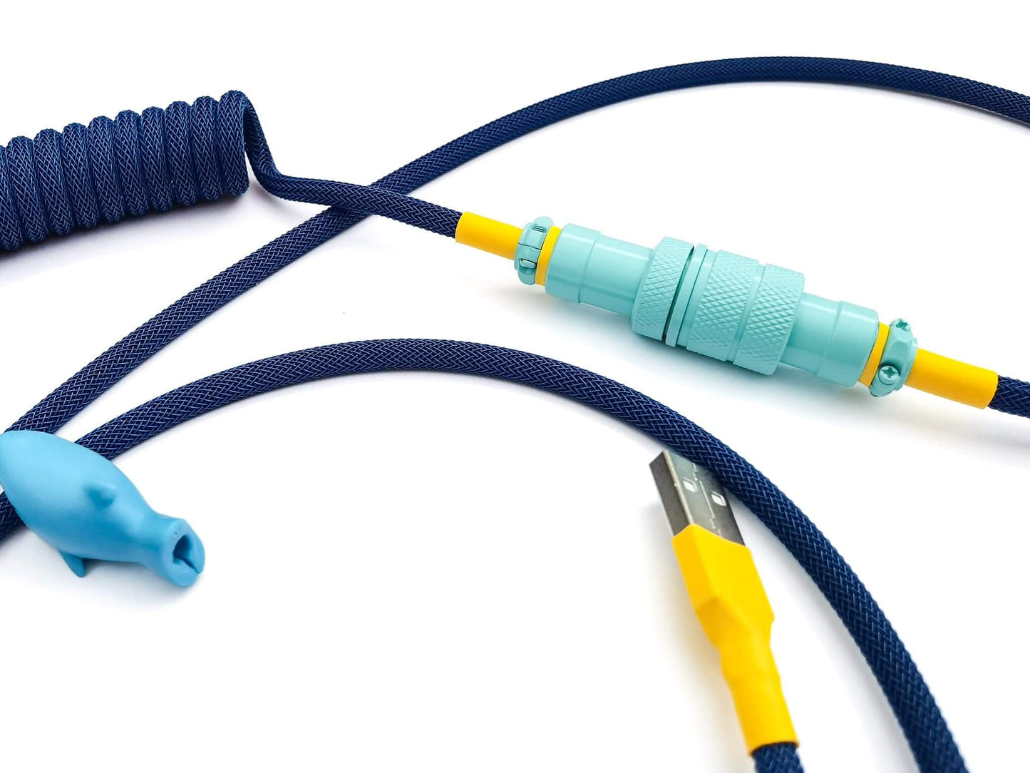 Painted in robin's egg teal Gx16 4-pin connector and yellow heat-shrink on navy blue coil cable
