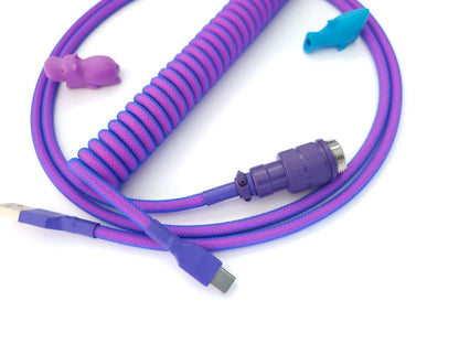 Neon Laser coiled cable with neon blue and pink coil and purple Aviator connector and USB C to C connection