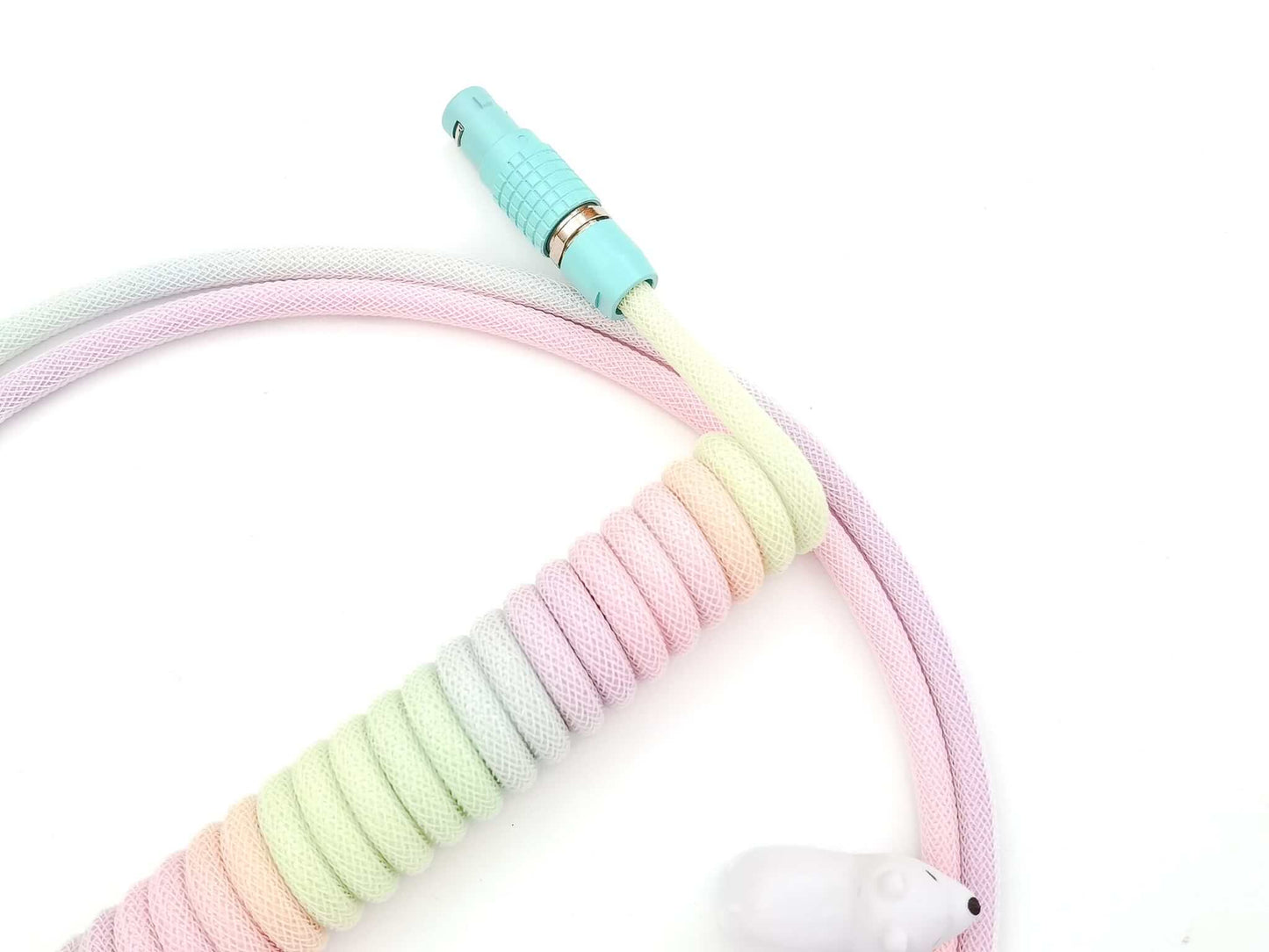 Lemo keyboard cable designed for POM Jelly keycaps with rainbow colored coil and Lemo in teal
