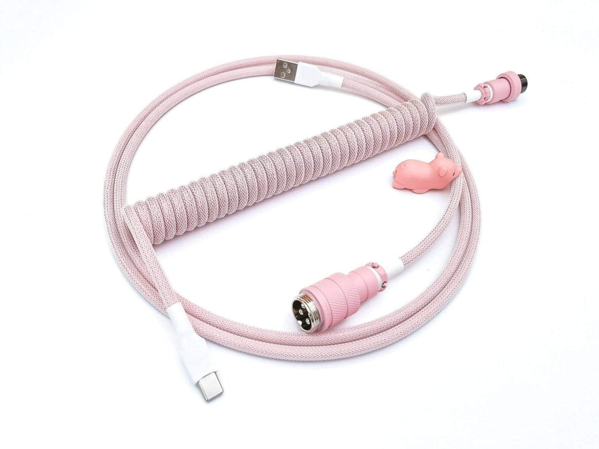 Pastel pink coiled cable with pink Gx16 connector, white heat-shrink and USB C connection, and pink cable bite protector
