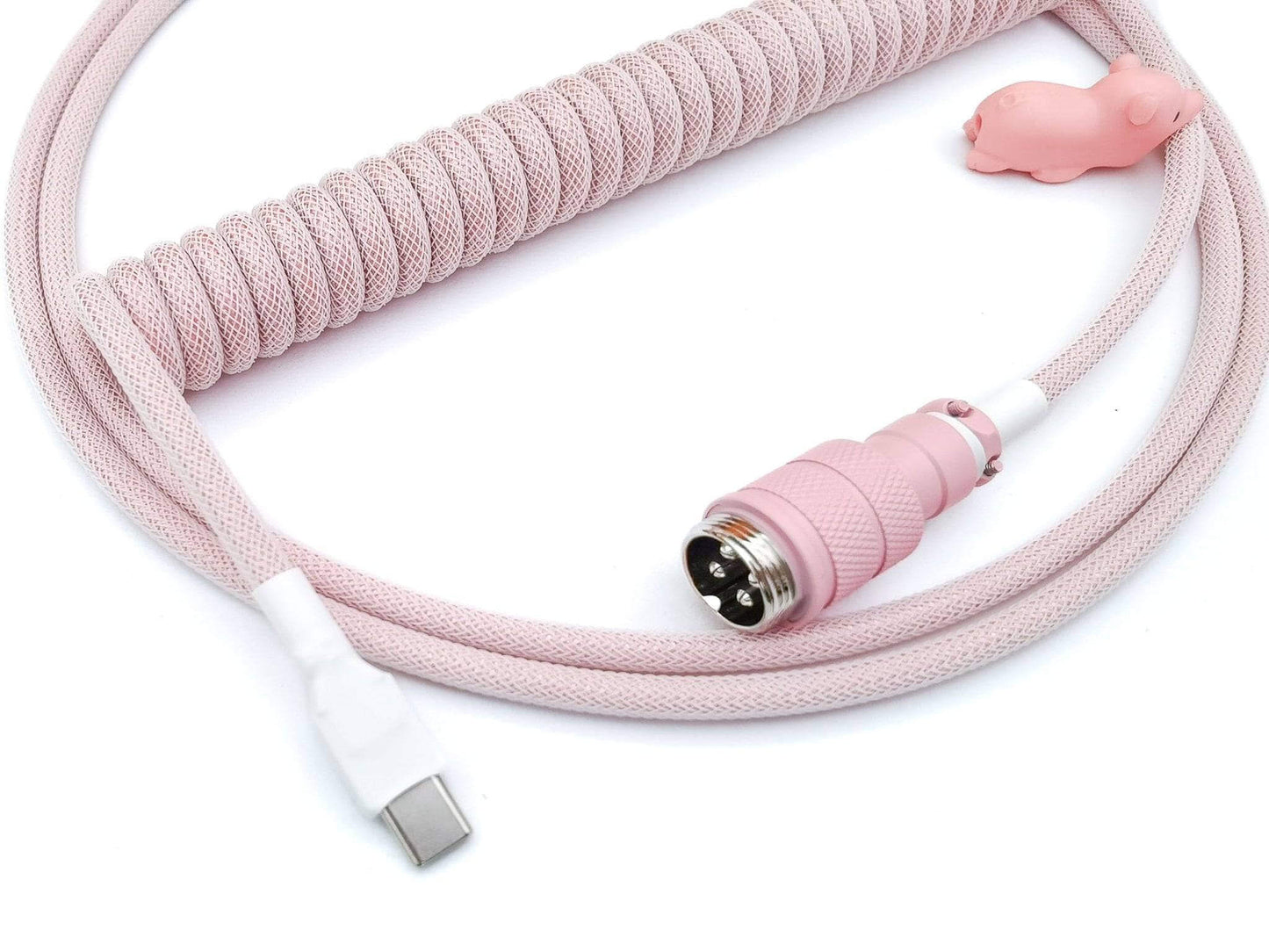Pastel pink keyboard cable designed to match pink keycaps and pink mechanical keyboards with pink Aviator connector and white heat shrink