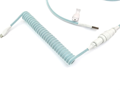 Custom coil cable in teal and white colors with white heat-shink, Gx16 Aviator connector and USB C to A connection.