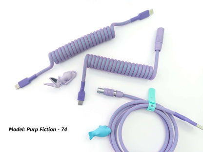 Light purple set of coiled cables. A USB C to C cable for split mechanical keyboards and a 4" USB C to A cable, with light purple Lemo 4-pin connector.