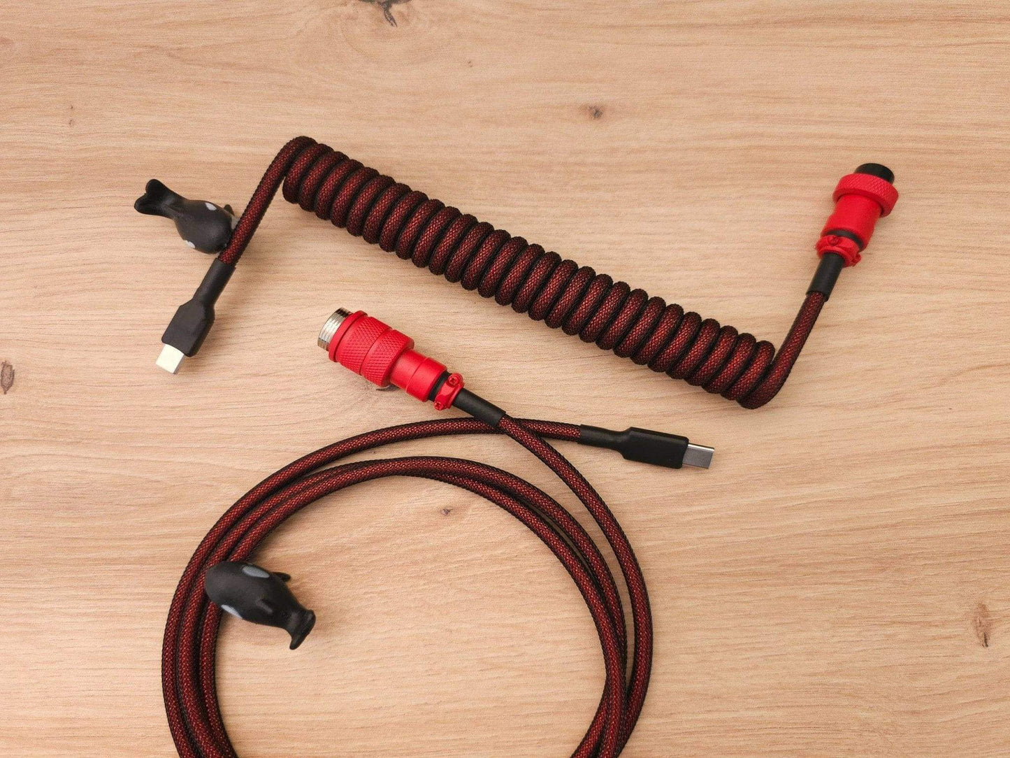 Dark red keyboard cable for red mechanical keyboards setups with bright red Aviator connector, USB C to C connection and black orca cable bites
