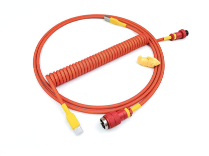 Red coiled cable with yellow heat-shrink and red Gx16 connector.
