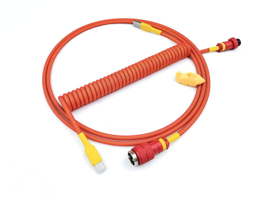Red coiled cable with yellow heat-shrink and red Gx16 connector.