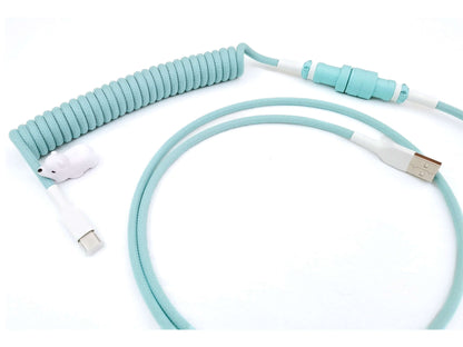 Custom keyboard cable in teal color with Gx16 connector painted in robin's egg teal color and white heat-shrink and white cable bite bear