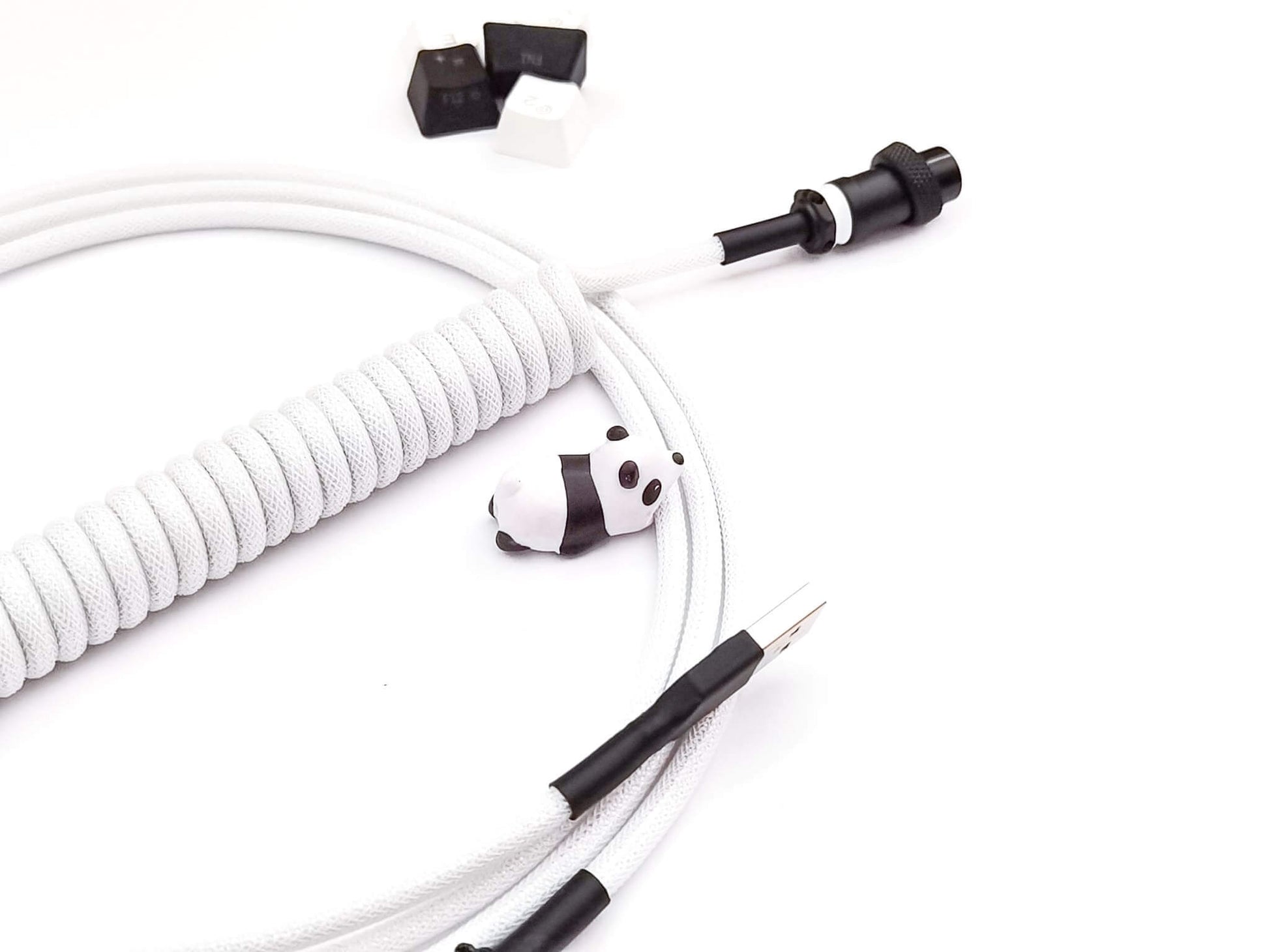 Coiled keyboard cable in black on white colors for black on white keycaps and black and white keyboards