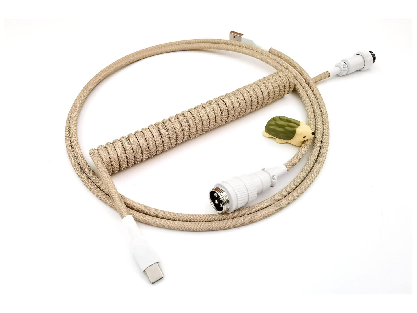 coiled keyboard cable in cream beige color with white Gx16 and cable bite protector