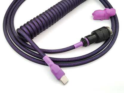 Coiled keyboard cable for GMK First love keycaps with dark purple colors and Avaitor in black and light purple heat shrink