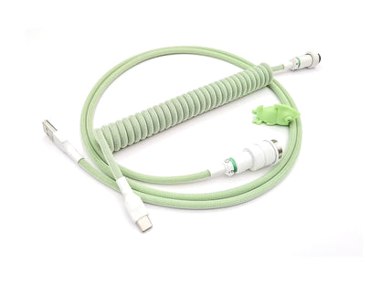 coiled keyboard cable in pastel green and white colors, with white Gx16 connector, and white heat shrink