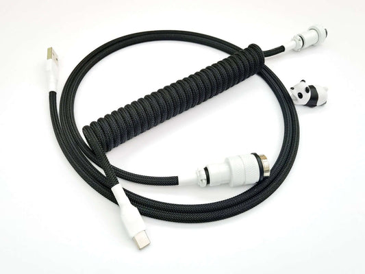Coiled keyboard cable with white and black colors and Gx16 and USB C connection